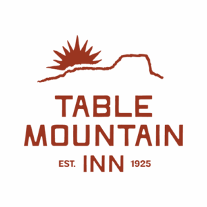 TMI_Primary_Rust Table Mountain Inn Logo